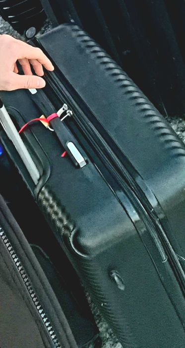 Lost my BLACK LUGGAGE WITH RED LANE (RIBBON)